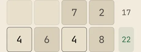 A band of a Crossums grid mid-solve - filled cells and target sums